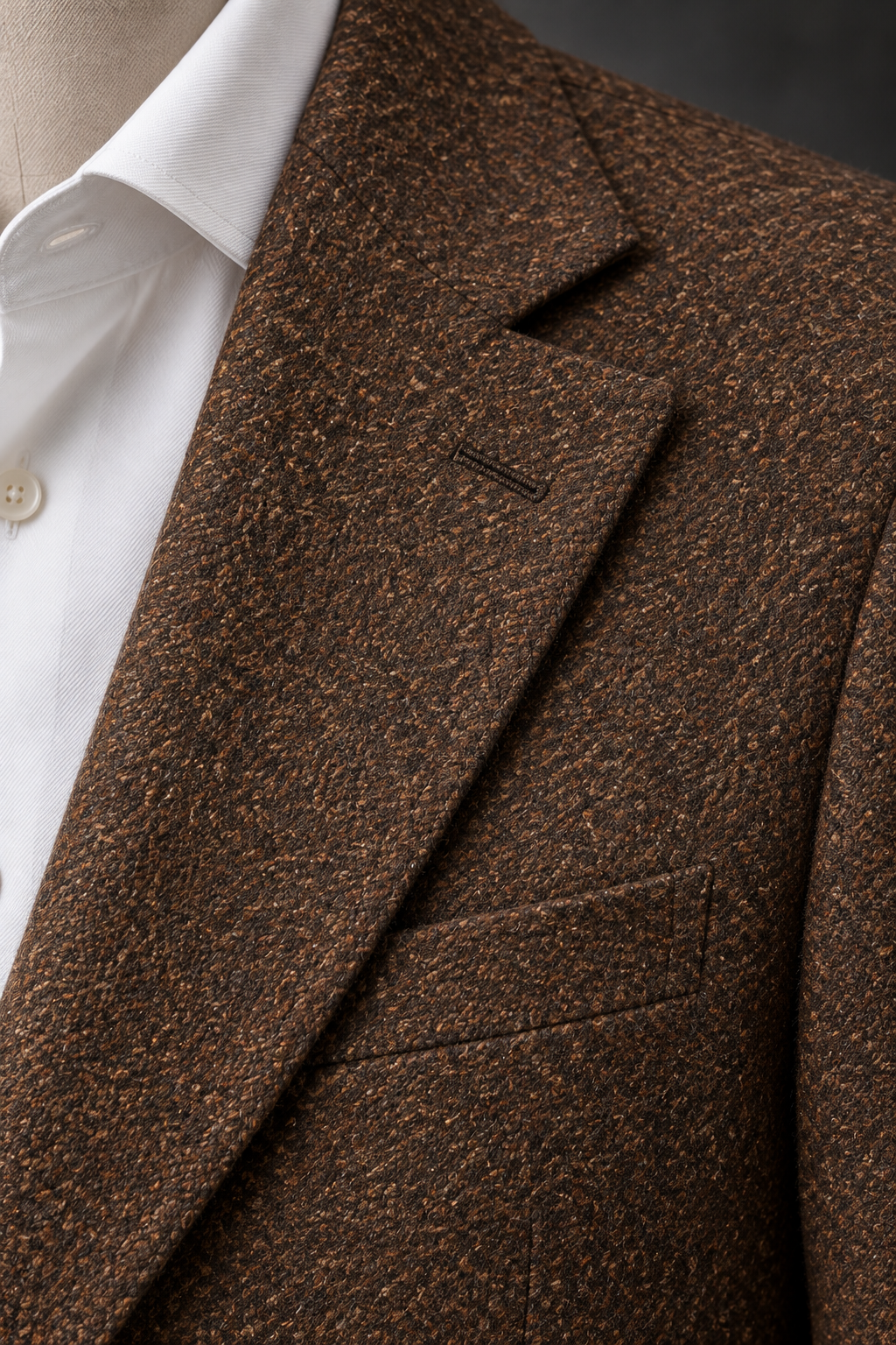 Close-up of the peak lapel and flecked brown fabric on the Brown Tweed Blazer Jacket.