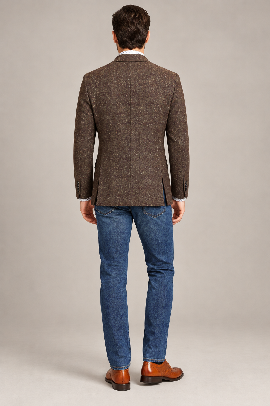 AI-illustrated rear view of the Brown Tweed Blazer Jacket styled with dark denim.